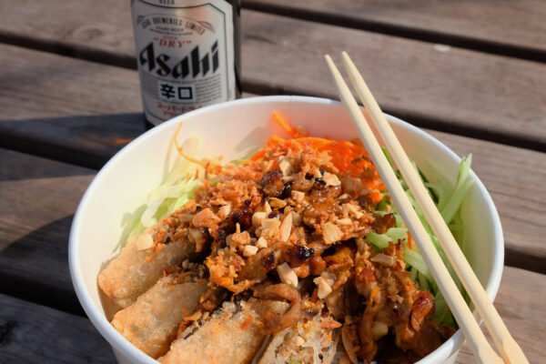 The Viet Street Food Company takeaway food with Asahi beer.